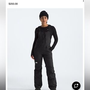 Black snow suit for skiing and snow boarding